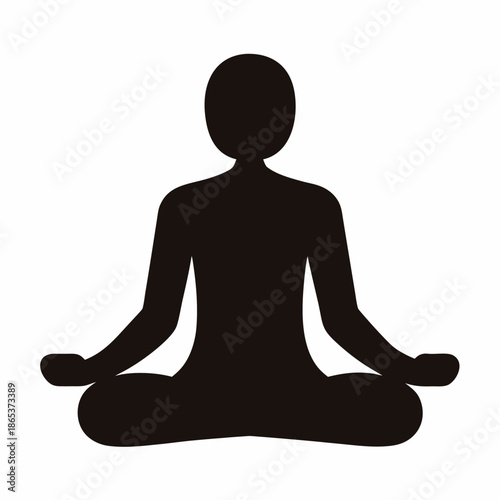 Silhouette of a person in lotus position meditating for relaxation