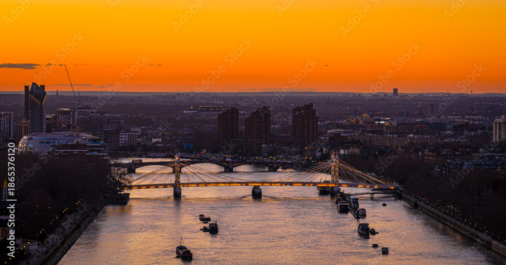 Fototapeta premium Albert Bridge panoramic view over River Thames at sunset, Chelsea London UK