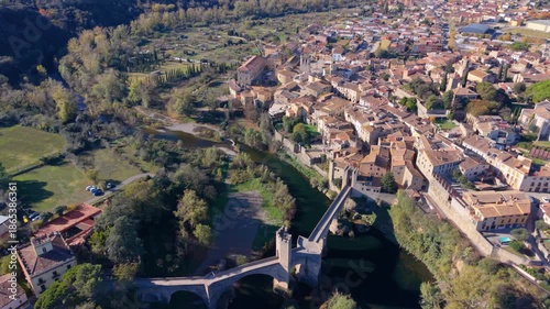 Aerial view flying over medieval town besalu and its romanesque bridge