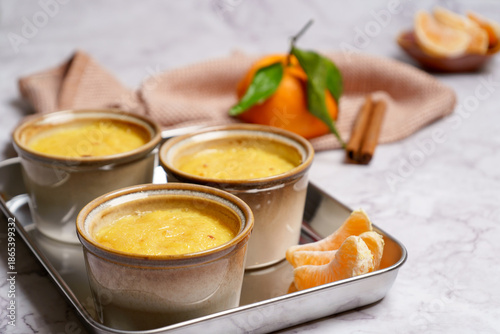 Crema catalana, a classic Spanish dessert served in ceramic ramekins. 