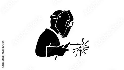 Welding worker in PageSpeed protective gear welding metal.