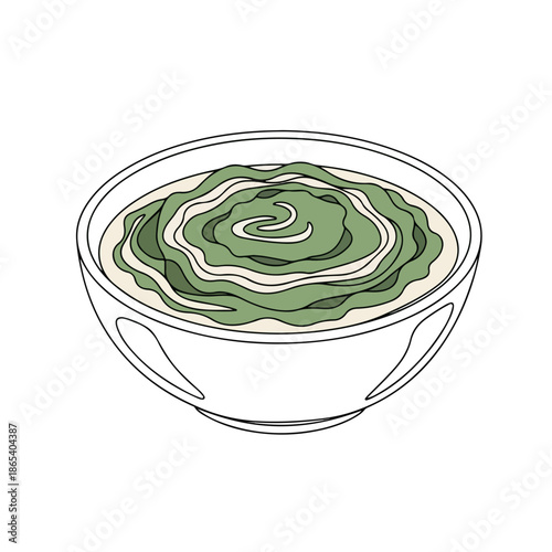 Delicious green soup in bowl with creamy texture and fresh herbs on top. Green soup features vibrant green colors and smooth consistency, perfect for winter food needs.