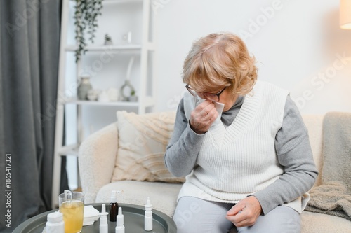 old woman at home feel sick runny nose