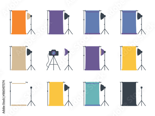 A collection of colorful studio backdrops and lighting equipment for photography