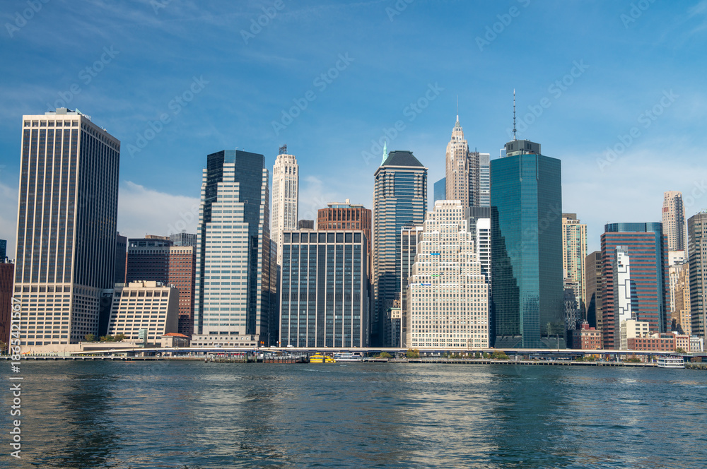 Naklejka premium Lower Manhattan Skyline, Iconic View of New York City's Urban Majesty