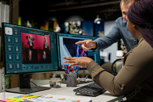 Tableau sur toile Diverse photo editing team generating AI content and retouching pictures, working on their creative portfolio with text to image program and futuristic software