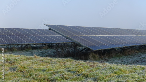 Solar panel farm in the countryside on a winter morning