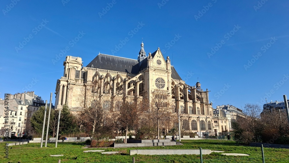 Fototapeta premium Church in Paris with clear skies and open space in foreground for text