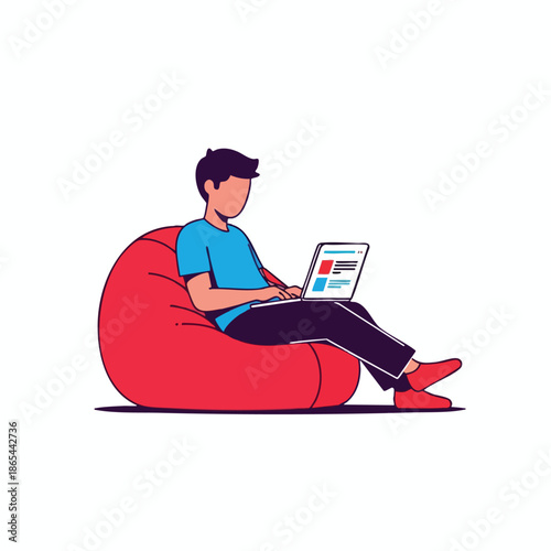 A person uses a laptop while sitting on a red beanbag chair