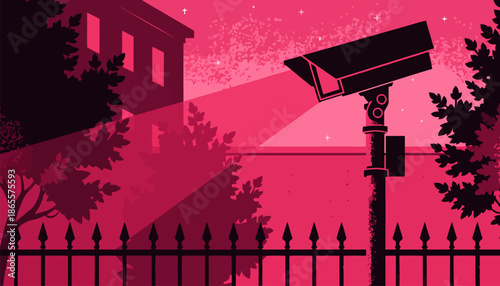 Security camera monitoring house with spotlight on fence