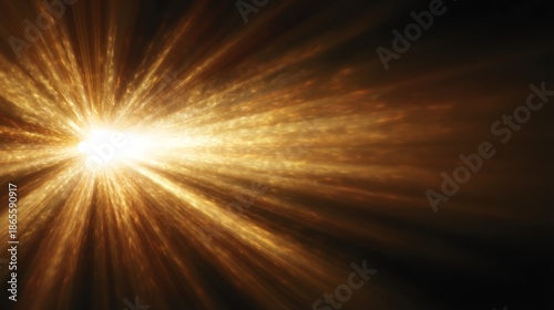 Radiant burst of golden light radiating outward from a central point against a black background