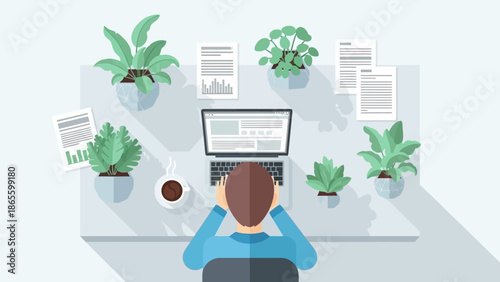 Man Working on Laptop at Desk.