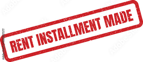 Distressed rectangular rubber stamp showing bold text reading rent installment made on a document