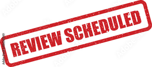 Distressed red rubber stamp impression marking an upcoming review appointment or assessment date planning