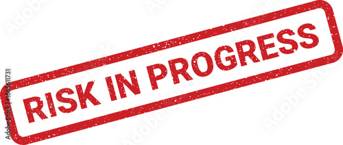 Distressed red rubber stamp with RISK IN PROGRESS message, indicating an ongoing hazard or evolving challenge in operations