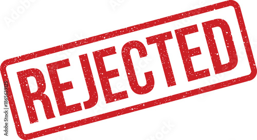 Red rubber stamp with a textured impression signifying that a document or application has been officially rejected