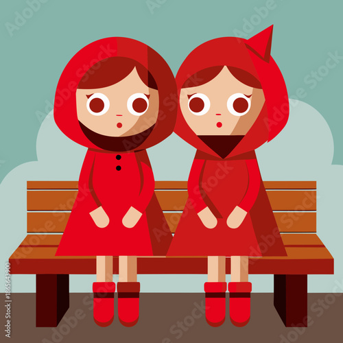 Dua boneka merah diatas bangku kayu panjang
