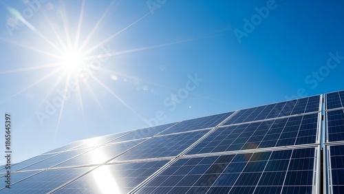 Solar panels brightly illuminated by the sun under a clear blue sky, symbolizing renewable energy and a sustainable, eco-friendly future for power generation technology