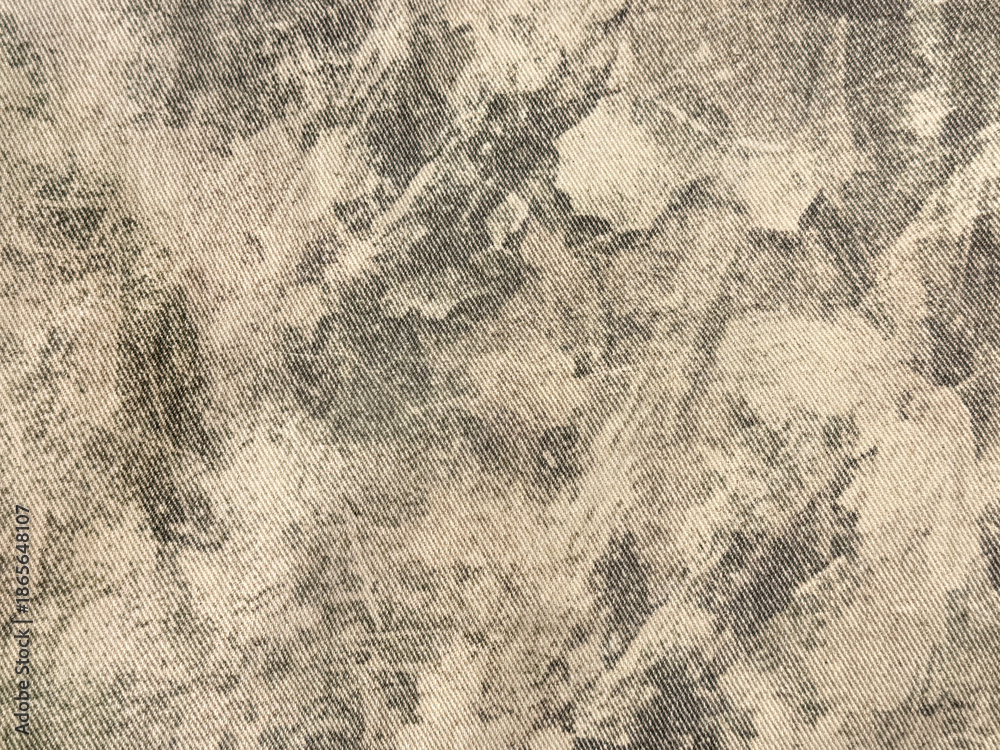 Naklejka premium Close up of random washed pattern on a fabric, in grey and white color. Rustic and weathered surface feel. Seamless background texture