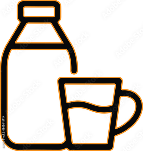 Milk bottle pouring into coffee cup