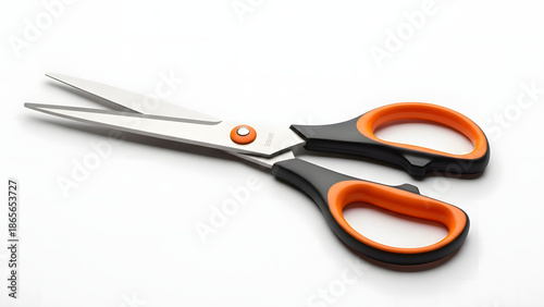 A pair of black and orange handled scissors on a white background