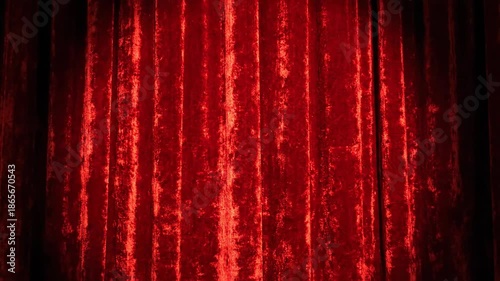 Red curtain backdrop with spotlight for performances and presentations