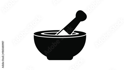 black silhouette of a mortar and pestle on a white background