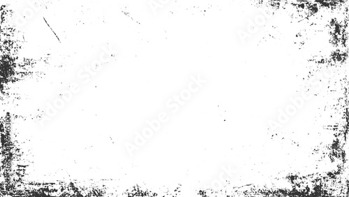 Black and white textured grunge background with distressed edges and scattered speckles