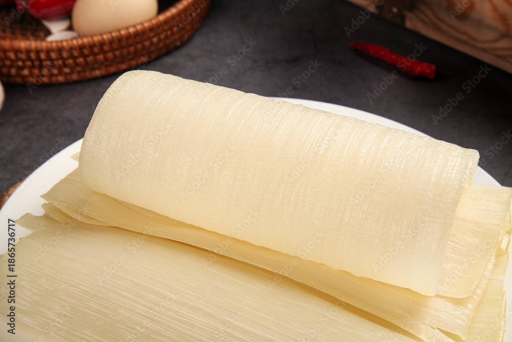 Fototapeta premium Fresh Rice Noodle Sheets - Traditional Asian Cuisine Ingredient