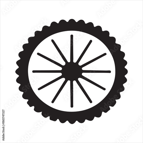 Black and white of a spoked wheel with a scalloped outer edge