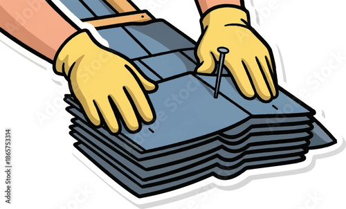 Hands wearing yellow gloves are carefully placing a nail through grey roofing shingles