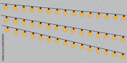 Three parallel lines of yellow glowing bulbs string lights on gray background