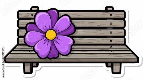 A wooden park bench adorned with a large, vibrant purple flower