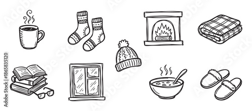 Collection of black and white doodle icons representing cozy winter essentials like a fireplace, warm socks, hot soup, a blanket, and books for a comfortable hygge concept
