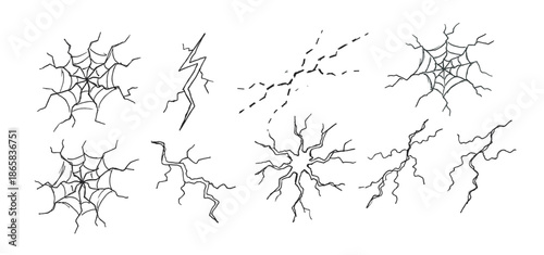 Hand drawn collection of spiderwebs and cracks in a black and white doodle style, a set of spooky Halloween elements like cobwebs, lightning bolts, and surface fractures