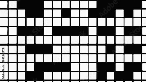A crossword puzzle grid with empty white squares and black blocks
