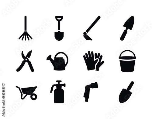 Garden Tools Icons. Garden tools. Solid icon set of garden tools: rake, shovel, hoe, trowel, pruning shears, watering can, gloves, bucket, wheelbarrow,