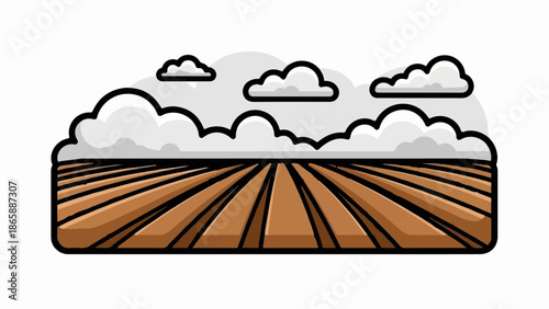 Ploughed field under a cloudy sky