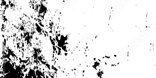 Abstract black and white grunge background featuring a vector ink splash pattern with paint splat stains and a dirty spray texture border for artistic banner decoration