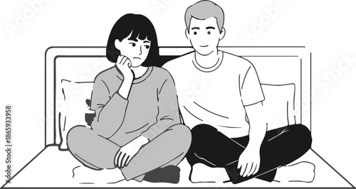 Two people sitting on a bed, one looks distressed, the other comforting