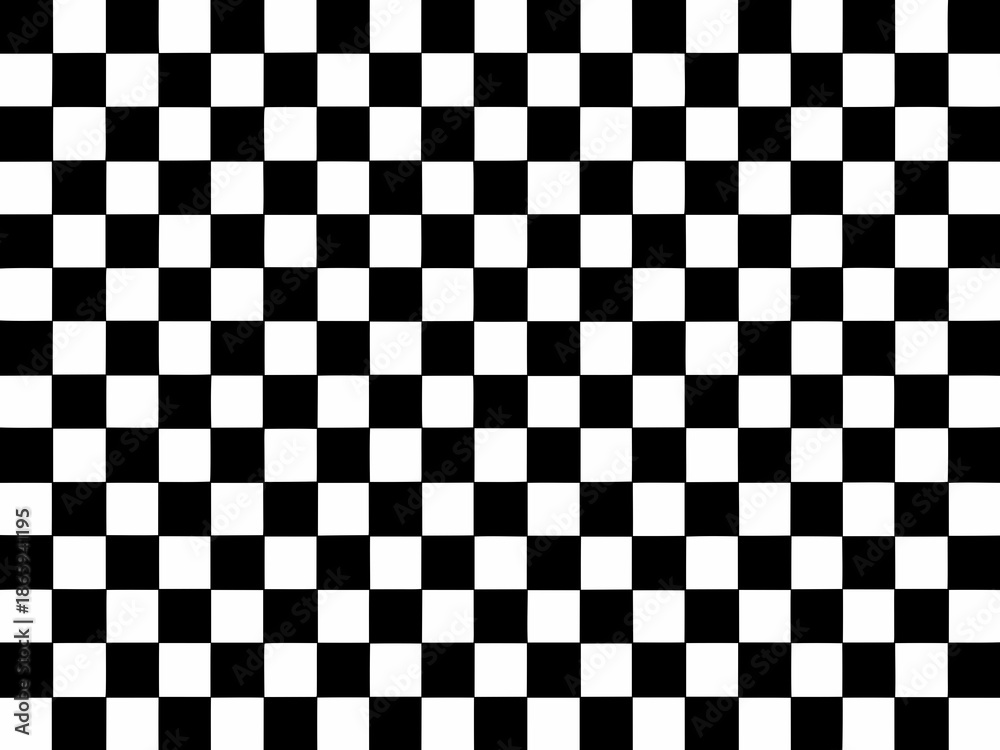 Fototapeta premium A black and white checkered pattern fills the entire frame of the image