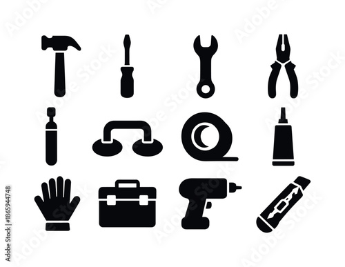 Black Icon Tool Set. Repair tools. Solid icon set of repair tools: hammer, screwdriver, wrench, pliers, glass cutter, suction cup lifter, tape roll, sealant