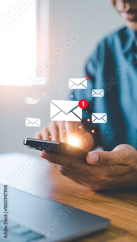 Man uses smartphone with overlaid mail icons indicating notification and new message