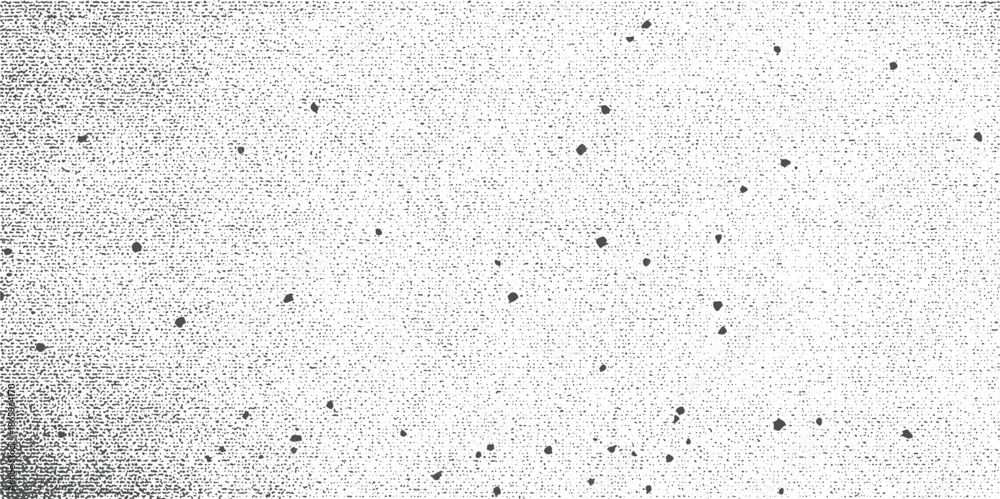 Obraz premium Black dots scattered on a textured grey background with a gradient effect abstract