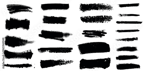 Collection of black brush strokes on a white background for artistic and design purposes