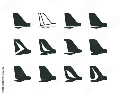 Gliding Logo Variations. gliding. Icon set. Set Logo of gliding: tail fin silhouette. harmonious logo variations of the same emblematic concept, each with