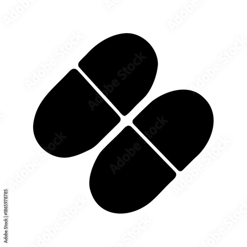 Two black capsule pills overlapping each other, representing medication and healthcare