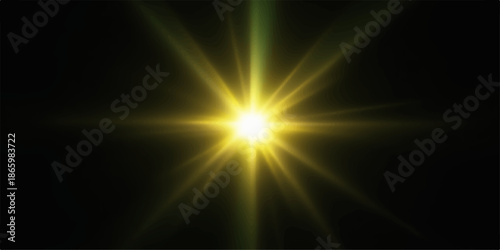 Bright yellow starburst light on black background