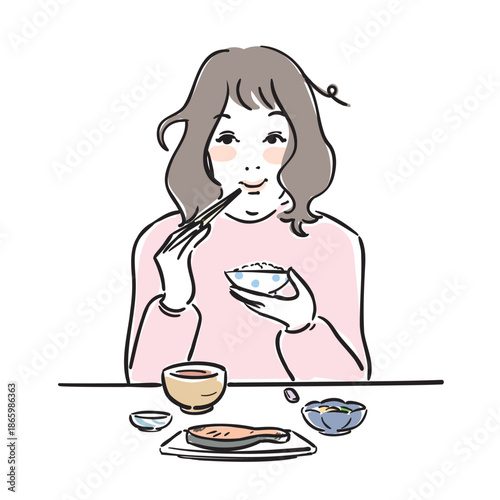 朝ごはんを食べる可愛い女性　和食