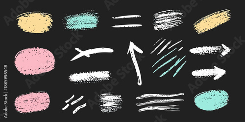 Set of hand drawn colorful chalk texture brush strokes including arrows, dots, scribbles, underline, and paint spots on black background for design elements and artistic decoration